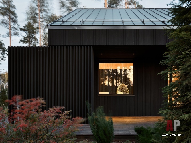 Фото фасада деревянного дома в современном стиле